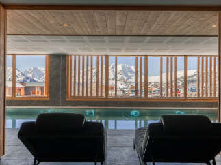Luxury chalet with indoor pool and stunning mountain views.