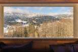 Wake up to breathtaking mountain views from this cozy cabin.