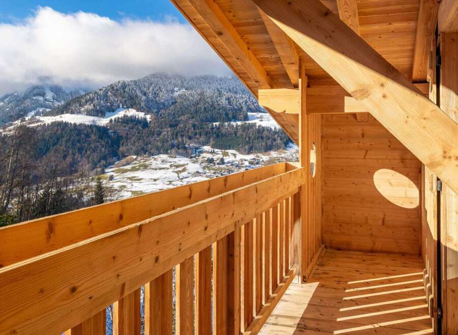Wake up to breathtaking mountain views from this stunning wooden chalet.