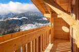 Wake up to breathtaking mountain views from this stunning wooden chalet.