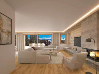 This stunning chalet boasts a spacious open-plan living area with floor-to-ceiling windows offering breathtaking mountain views.