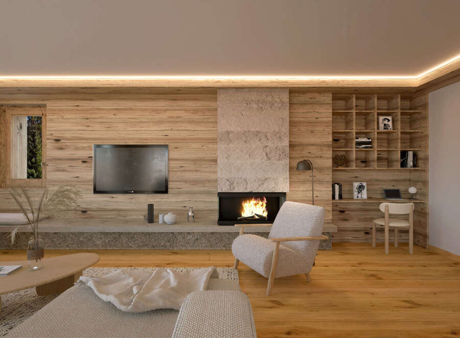This stunning living room boasts a cozy fireplace, built-in shelving, and a large TV, perfect for relaxing evenings.