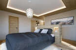 Experience luxury and comfort in this stunning bedroom.