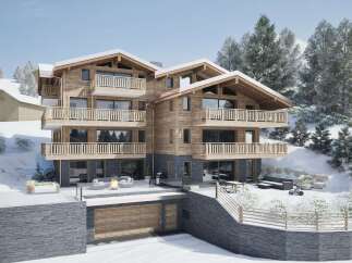 This stunning chalet boasts a prime location, offering breathtaking views and easy access to slopes.