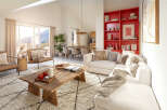 Stunning open-plan living space with floor-to-ceiling windows offering breathtaking mountain views.