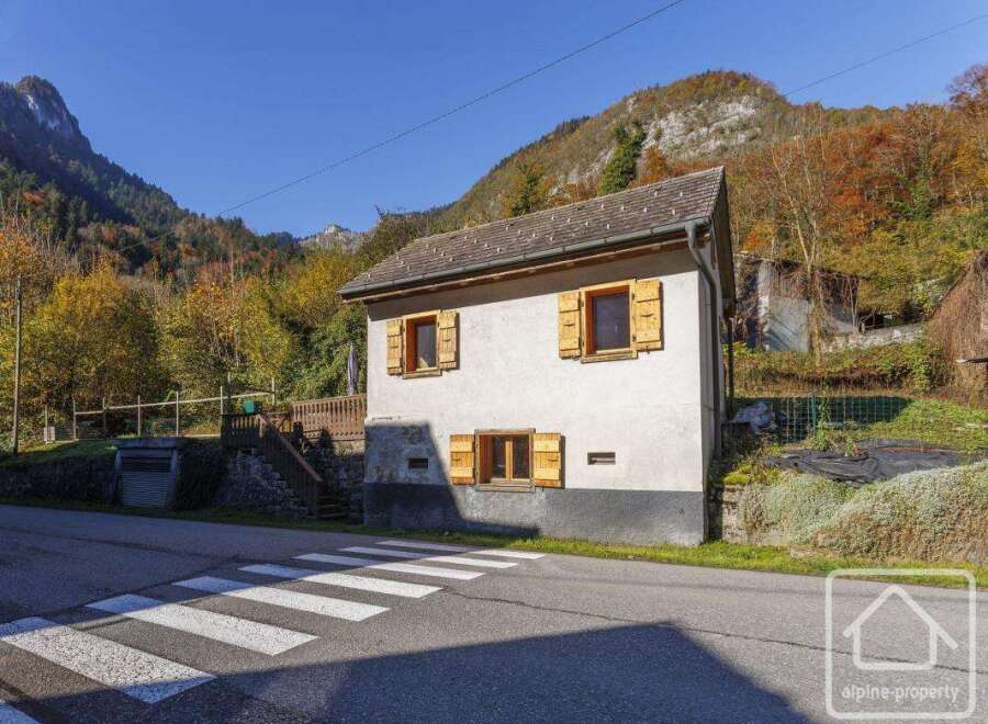 Charming mountain chalet nestled in the French Alps, boasting stunning views and a tranquil setting.