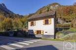 Charming mountain chalet nestled in the French Alps, boasting stunning views and a tranquil setting.