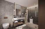 This luxurious bathroom boasts a spacious walk-in shower with glass enclosure, a sleek floating sink vanity with ample storage, and modern matte black fixtures.