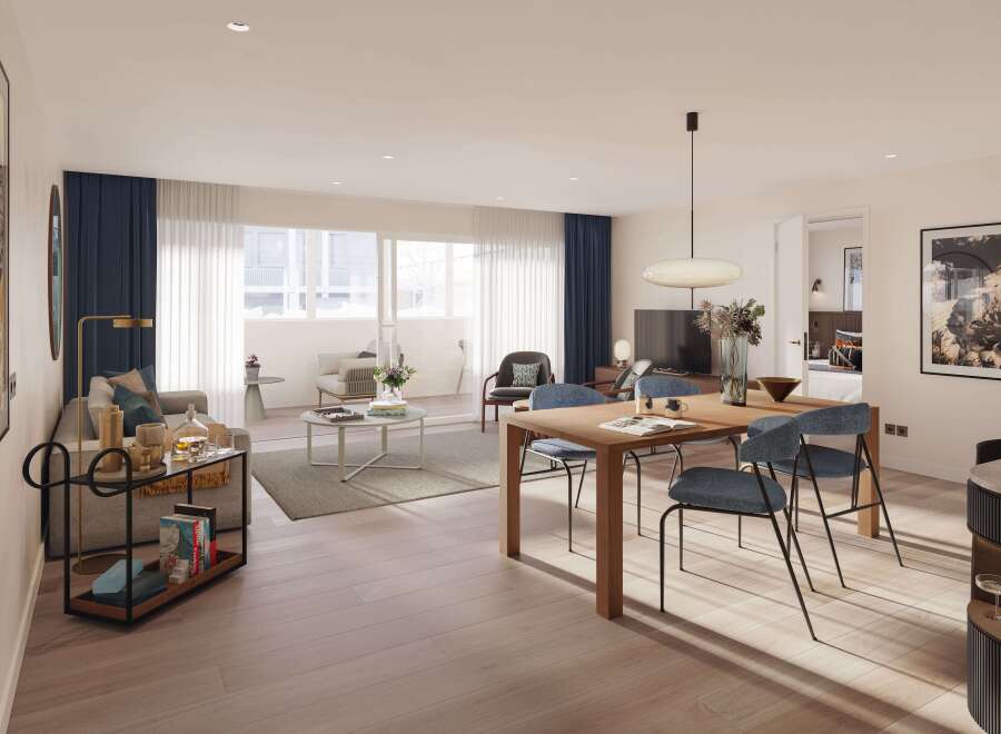 This stunning apartment boasts an open-plan living and dining area, perfect for entertaining.