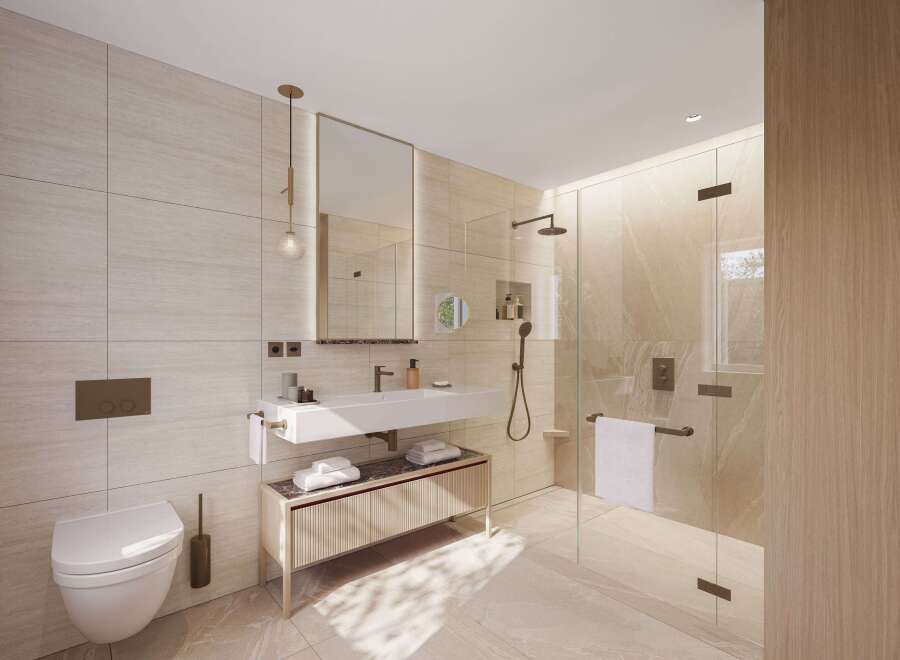 This luxurious bathroom boasts a spacious walk-in shower with a rainfall shower head and a sleek, modern vanity with ample storage.