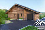Stunning chalet with attached garage, nestled in a picturesque mountain setting.