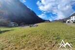 Build your dream home in the breathtaking Alps! This stunning plot offers a tranquil setting with mountain views and nearby amenities.
