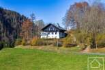 Nestled in the Austrian Alps, this charming chalet boasts breathtaking mountain views and a tranquil setting.