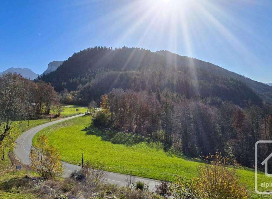 This idyllic property boasts breathtaking views of the French Alps, with sun-drenched meadows and a tranquil, winding road leading to your doorstep.