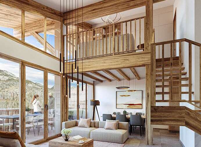 This stunning chalet boasts a spacious open-plan living area with floor-to-ceiling windows offering breathtaking mountain views.