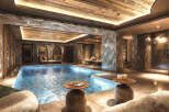 Indulge in the ultimate luxury with this stunning indoor pool and spa.