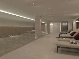 Indulge in the tranquility of this luxurious indoor pool and spa area.