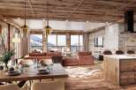 This stunning chalet boasts an open-plan living area with floor-to-ceiling windows offering breathtaking mountain views, a modern kitchen with a large island, and a cozy dining area perfect for entertaining.