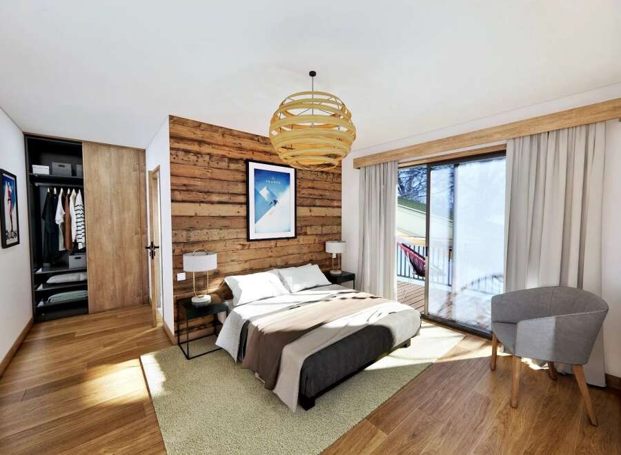 This stunning bedroom boasts a rustic wood accent wall and a cozy ambiance, perfect for relaxation.