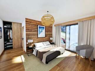 This stunning bedroom boasts a rustic wood accent wall and a cozy ambiance, perfect for relaxation.