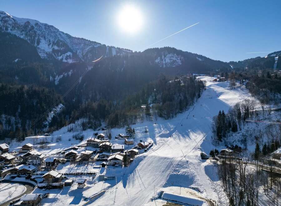 Discover the charm of this stunning mountain property, nestled in a picturesque ski resort.