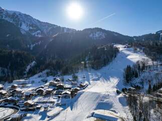 Discover the charm of this stunning mountain property, nestled in a picturesque ski resort.
