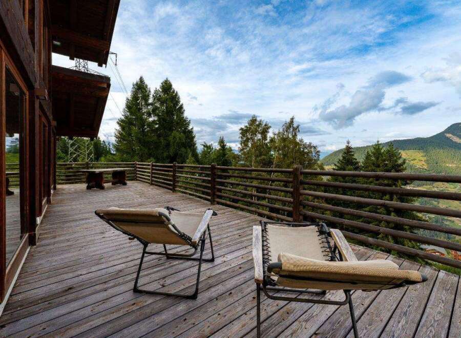 Enjoy breathtaking mountain views from this stunning deck.