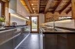 Experience the epitome of rustic elegance in this stunning kitchen.