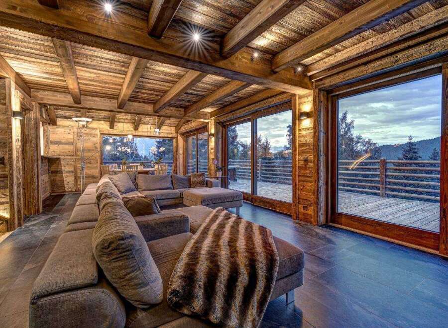 Experience luxury living in this stunning chalet, featuring exquisite wooden interiors and breathtaking views.