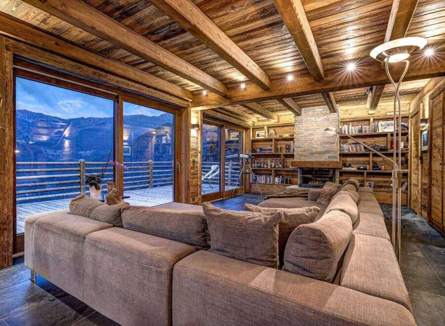 Experience luxury living in this stunning chalet with breathtaking mountain views.