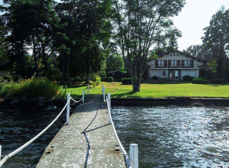 Stunning waterfront property with a private dock, offering serene lake views.