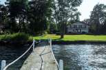 Stunning waterfront property with a private dock, offering serene lake views.