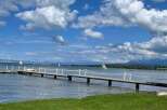 Lakefront property with private dock, offering serene views and easy access to watersports.