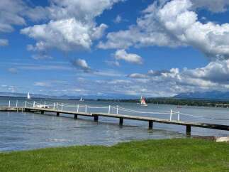 Lakefront property with private dock, offering serene views and easy access to watersports.