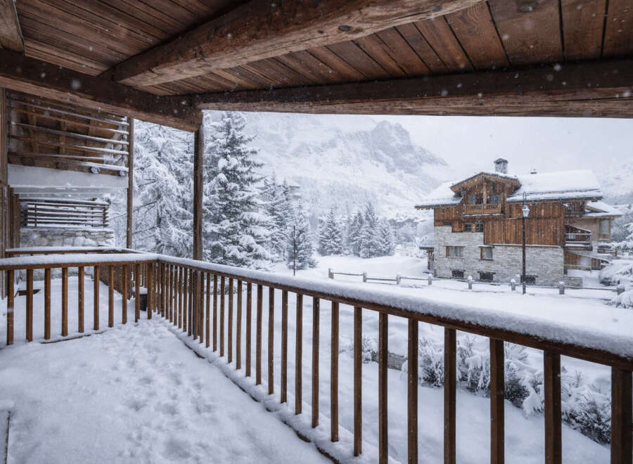 Experience the charm of this stunning mountain chalet, nestled in a picturesque winter wonderland.