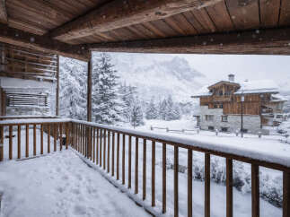 Experience the charm of this stunning mountain chalet, nestled in a picturesque winter wonderland.