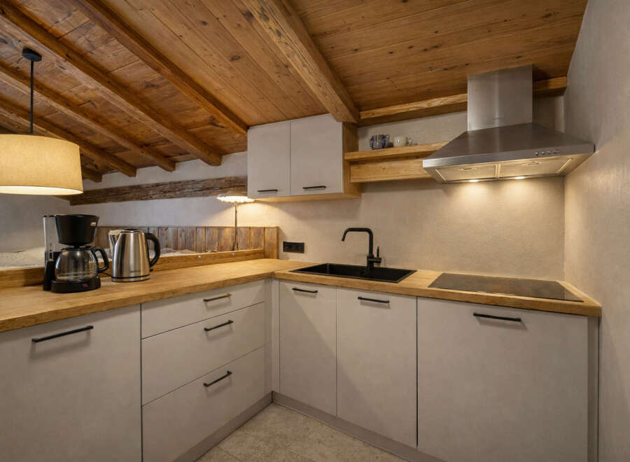 Discover the charm of this beautifully designed kitchen, perfect for culinary enthusiasts.