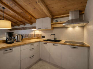 Discover the charm of this beautifully designed kitchen, perfect for culinary enthusiasts.
