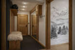 Step into a cozy and inviting entryway, perfect for welcoming guests.