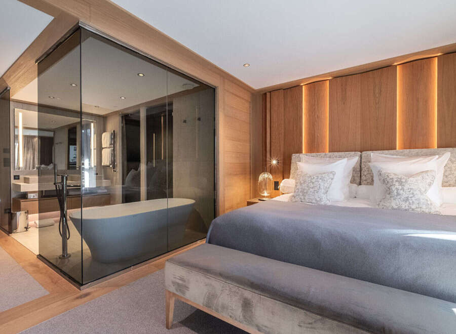 Experience luxury and tranquility in this stunning bedroom suite.