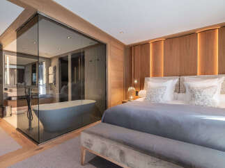 Experience luxury and tranquility in this stunning bedroom suite.