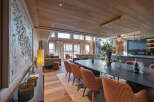 Experience luxury living in this stunning property, featuring a spacious dining area perfect for entertaining.