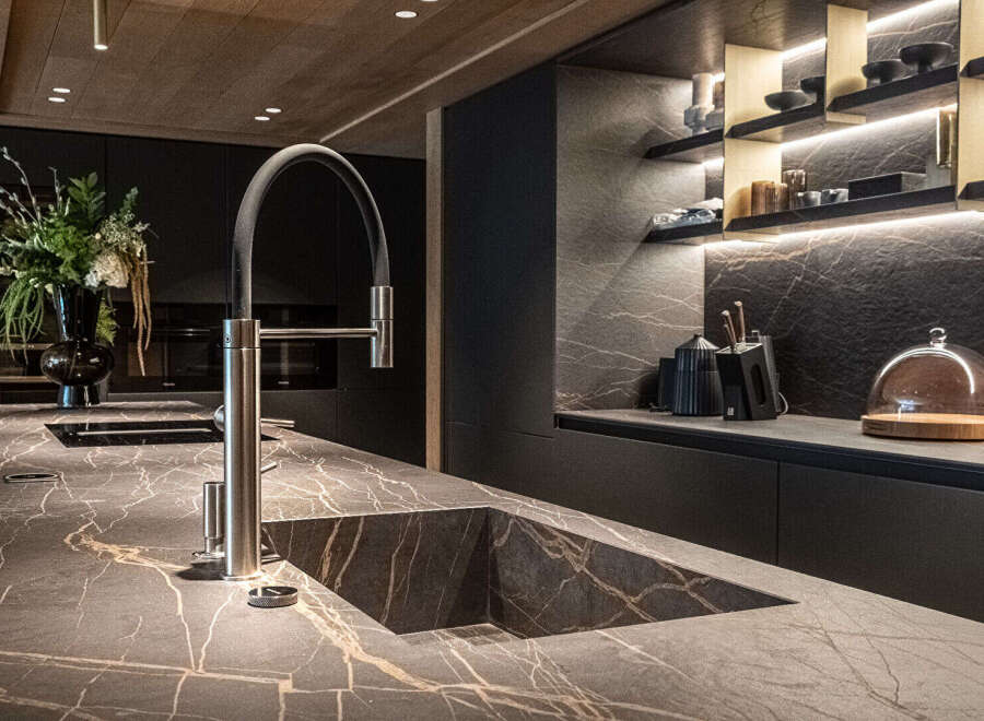 Experience luxury living in this stunning kitchen, featuring a sleek design and high-end finishes.
