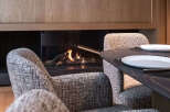 Experience luxury living with this stunning property featuring a cozy fireplace, perfect for creating a warm and inviting atmosphere.