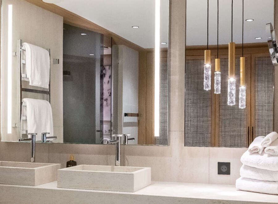 Step into luxury with this stunning bathroom design.