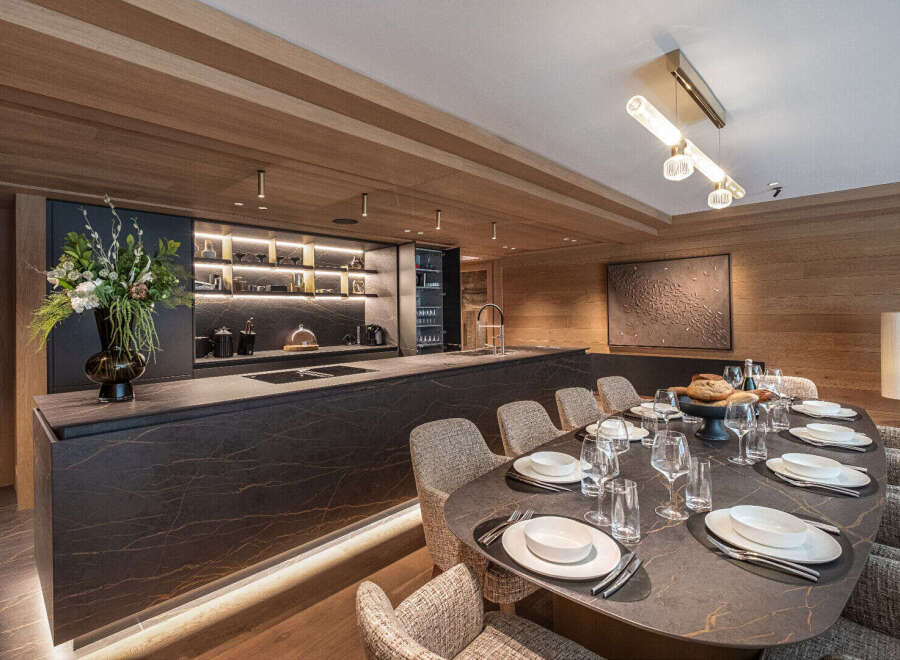 Experience luxury living in this stunning kitchen and dining area.