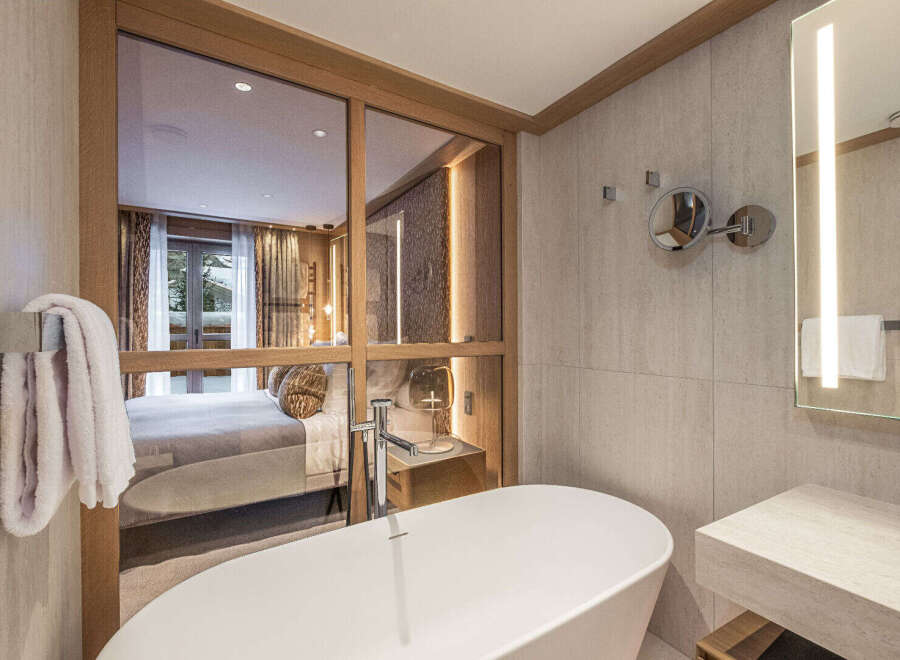 Experience luxury and relaxation in this stunning bathroom.