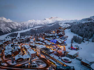 Experience the charm of a snow-covered mountain village, perfect for a winter getaway.
