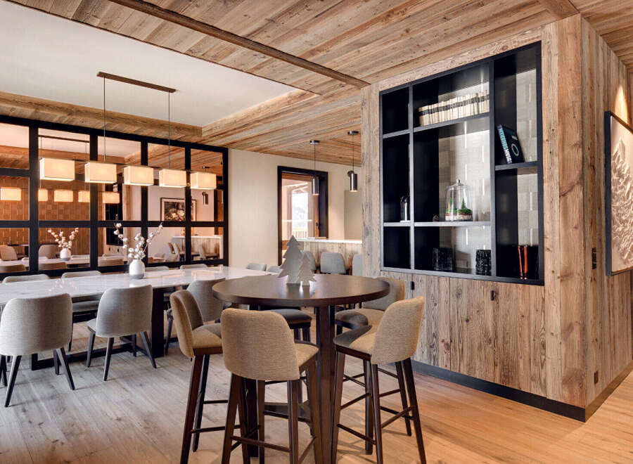Experience luxury living in this stunning property, featuring exquisite wooden accents and a modern design.