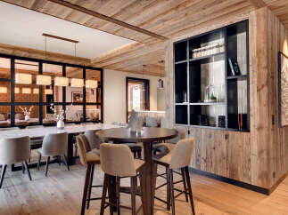 Experience luxury living in this stunning property, featuring exquisite wooden accents and a modern design.